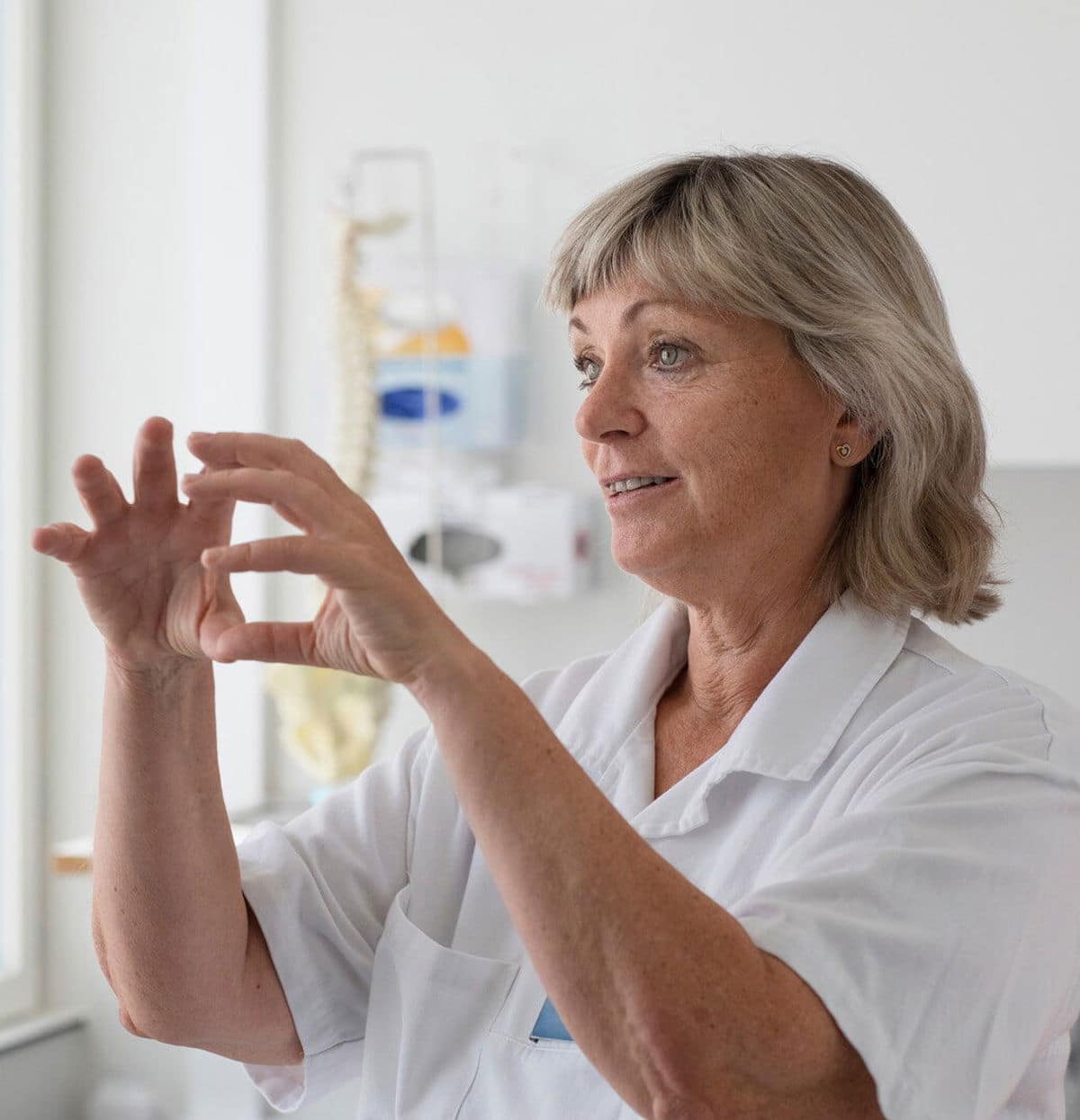 Portrait photo of Anna, a trained nurse explaining bowel function. If you are experiencing constipation, struggle to control your bowel, or frequently pass either liquid or hard stool, your MS may be affecting your bowel. 
